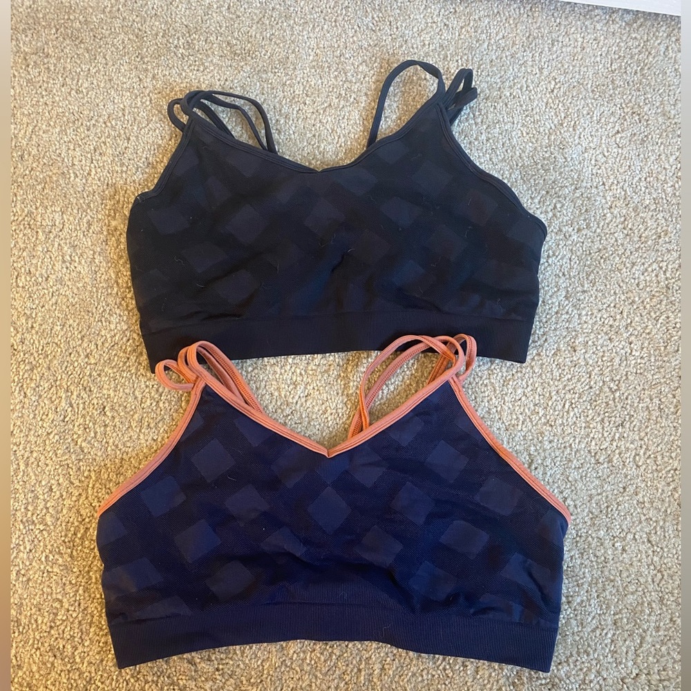2-smart wool sports bras. XL. Black and blue and orange.